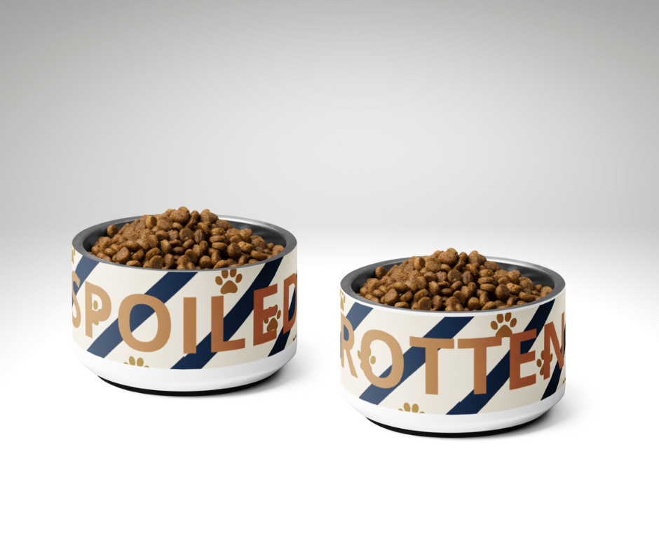 Two dog bowls labeled 'Spoiled' and 'Rotten' on a white background