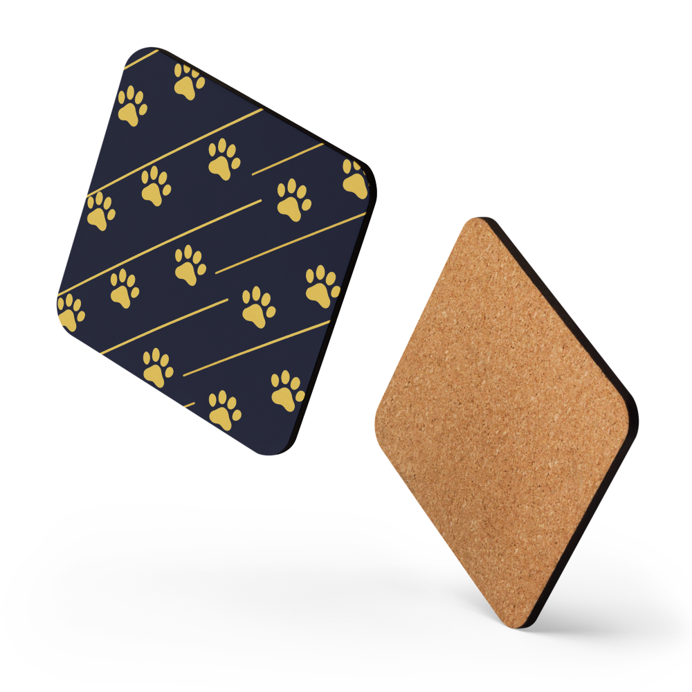Hexagonal coaster with paw print pattern on one side and cork back on the other, on a white background.