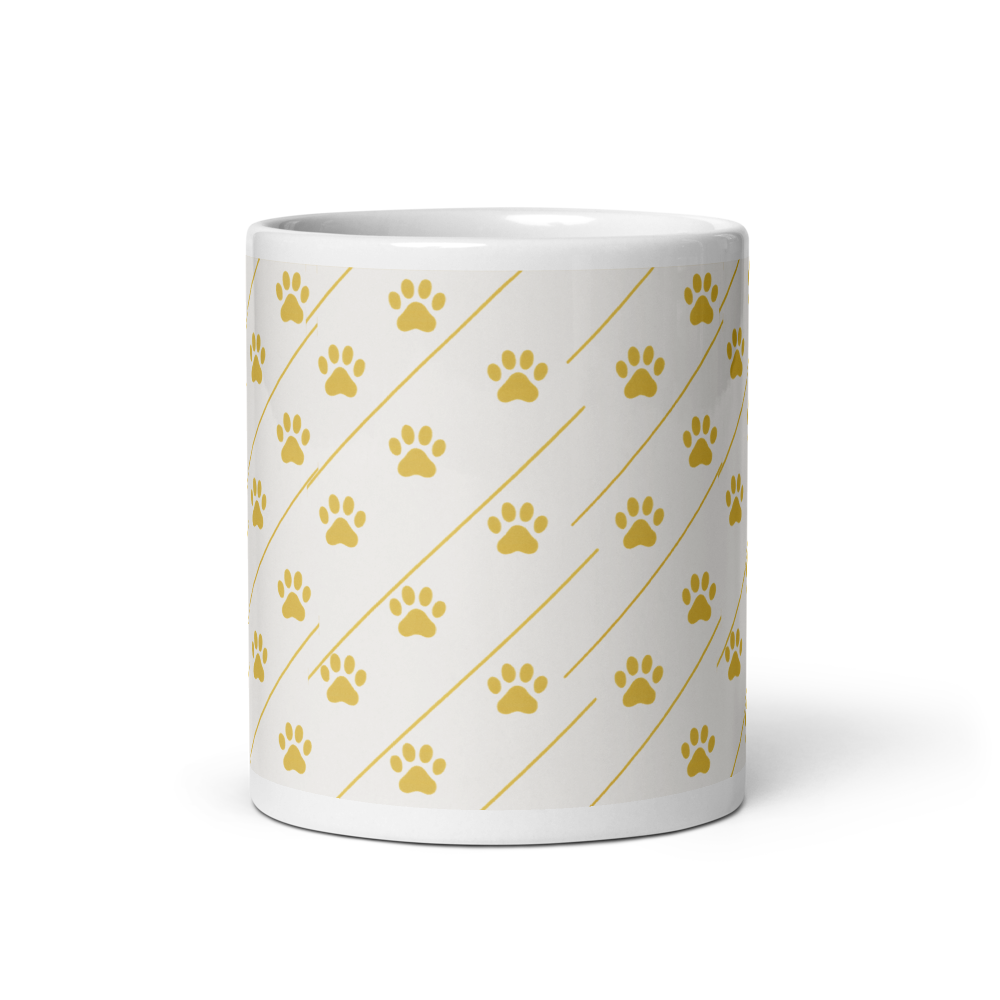 Ivory Whisper mug with gold paw print pattern on a white background