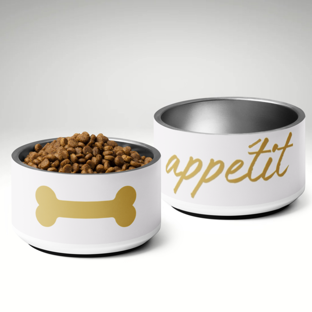 Two pet bowls, one with food and a bone design, the other with 'appetit' text, on a light gray background.