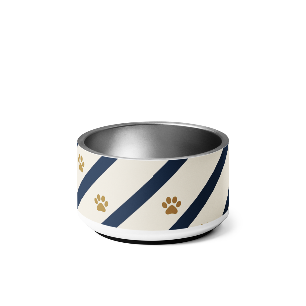 Dog bowl with blue and gold  striped pattern and paw prints on a ivory background