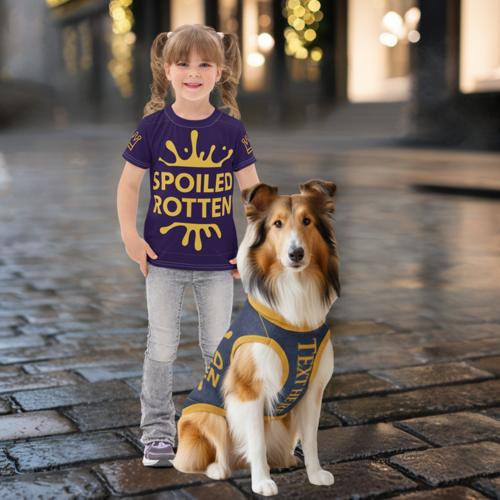 Child wearing a 'Spoiled Rotten' shirt with a dog in a matching outfit on a cobblestone street.